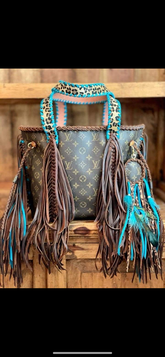 Lv fringe purse