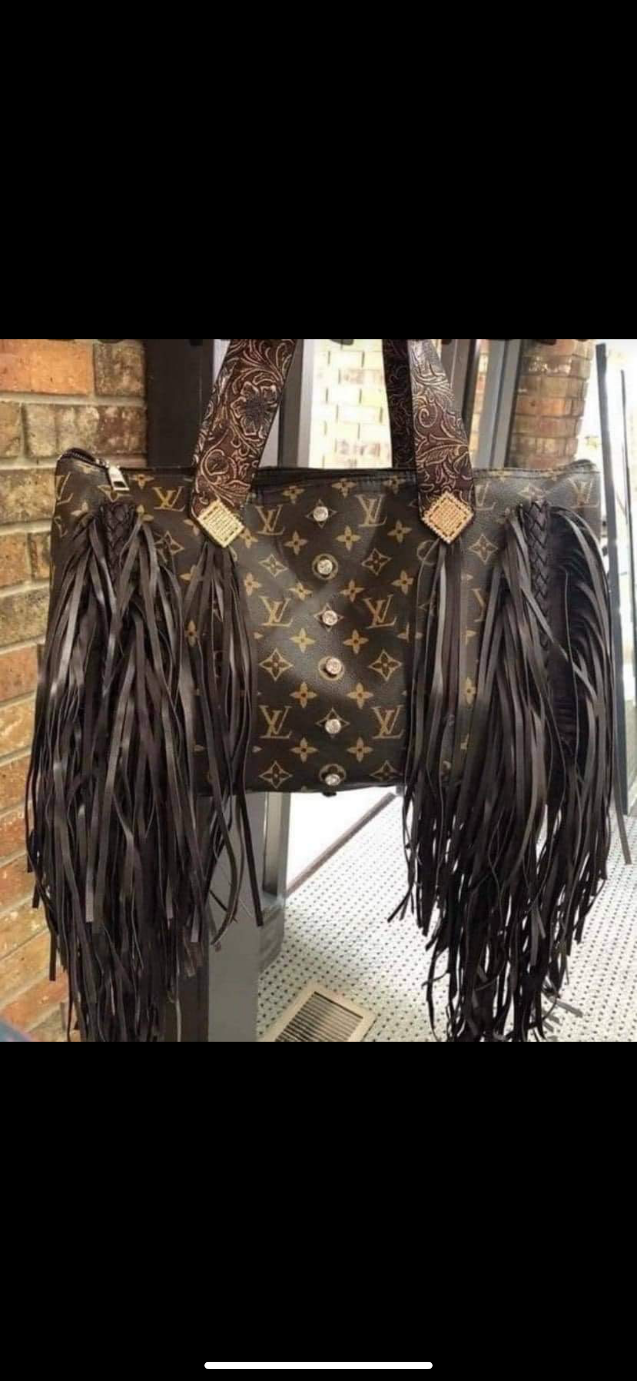 Lv fringe duffel bag